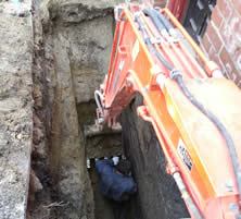 Small Excavator in the Trench