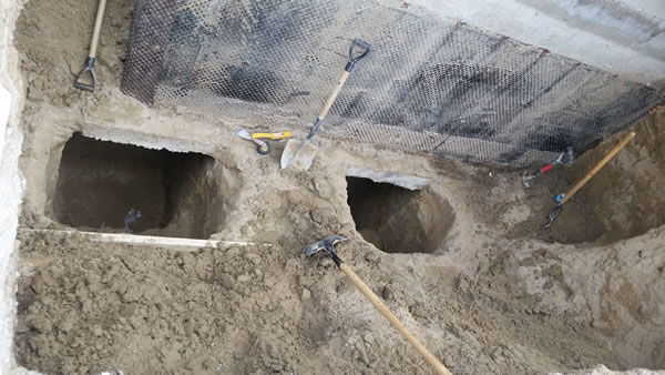 excavated foundation for underpinning