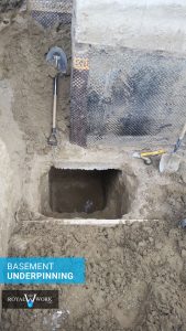 Exterior basement underpinning, Toronto project. Sections dug out.
