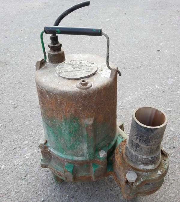 old metal sump pump