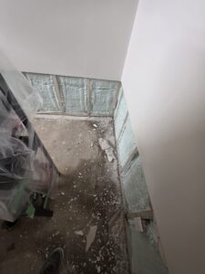 Fixing Foundation Cracks 1 Drywall removed in a home to expose wall.